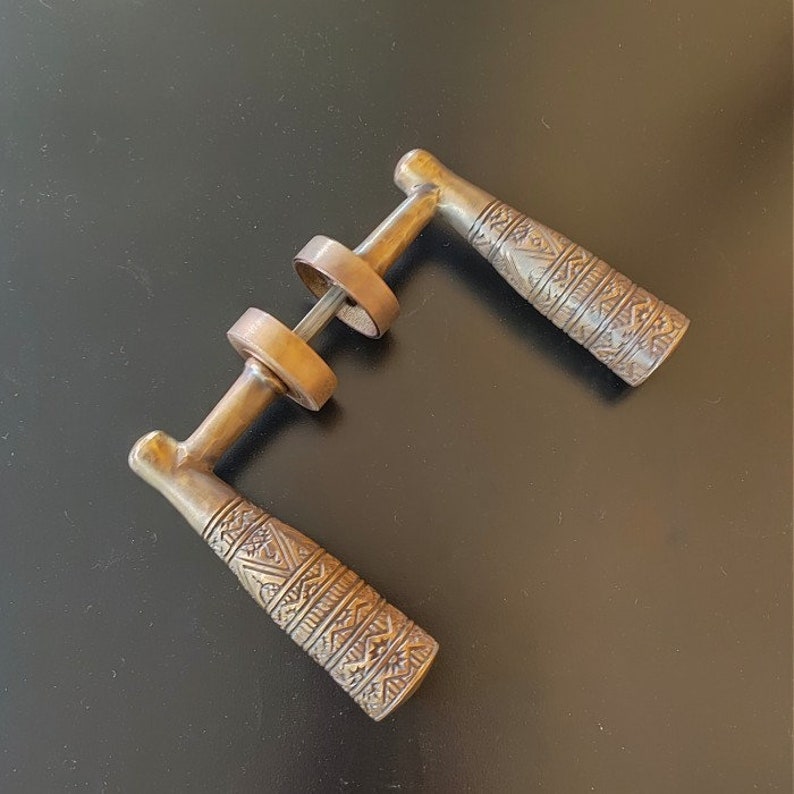 Pair of Crank Egypt Carved Vintage